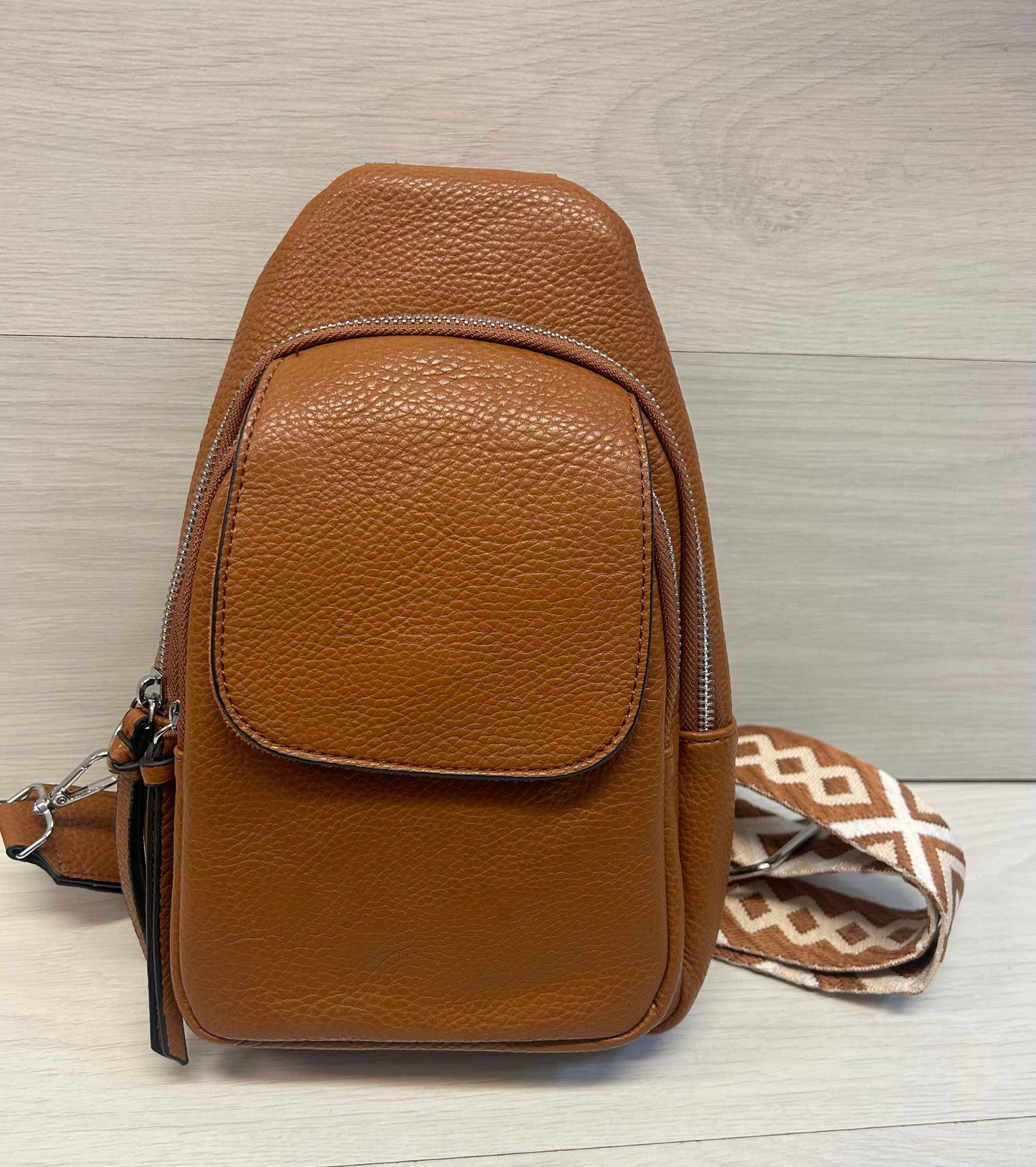 Tan slouch across body bag