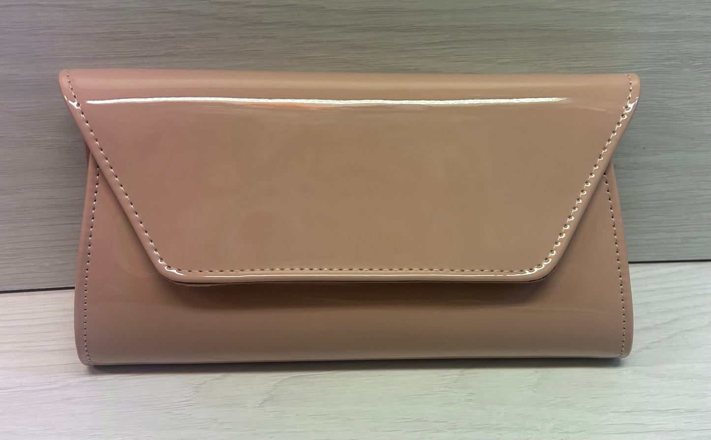 Nude Patent clutch bag