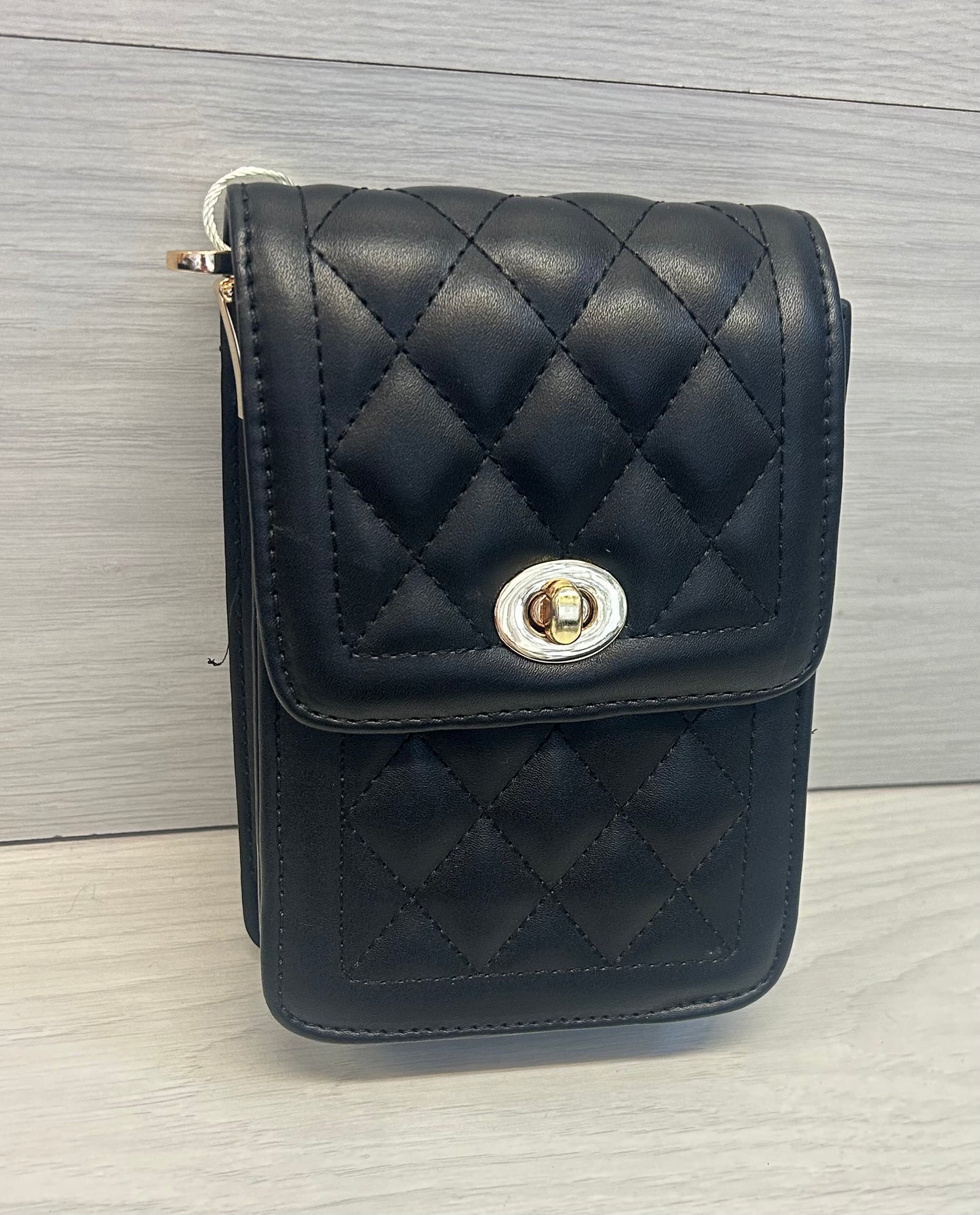 Black quilted phone bag