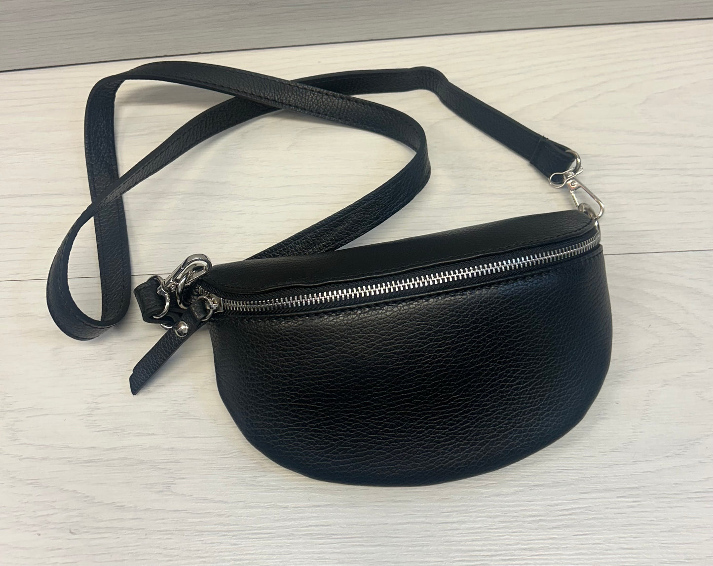 Black leather across body