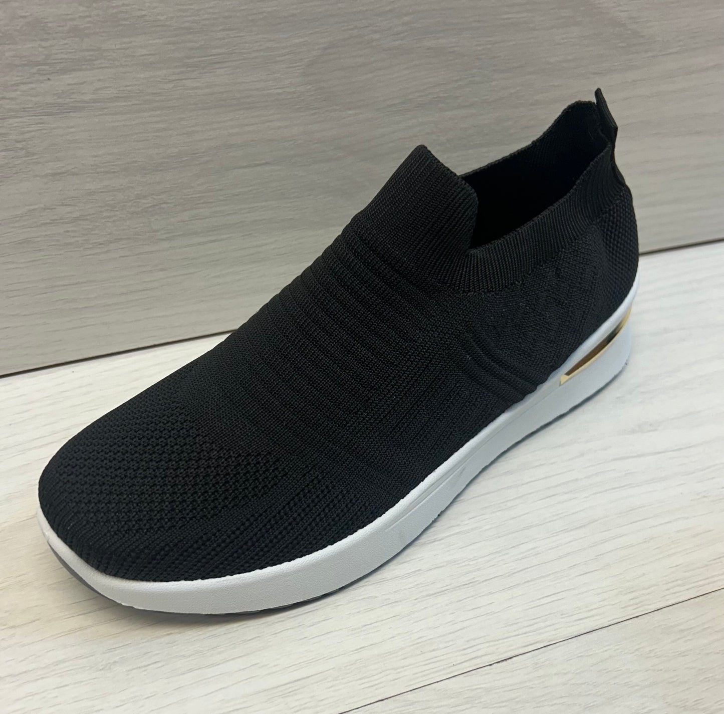 Black stretch trainers