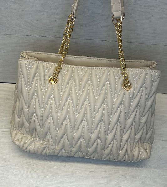 Beige quilted handbag